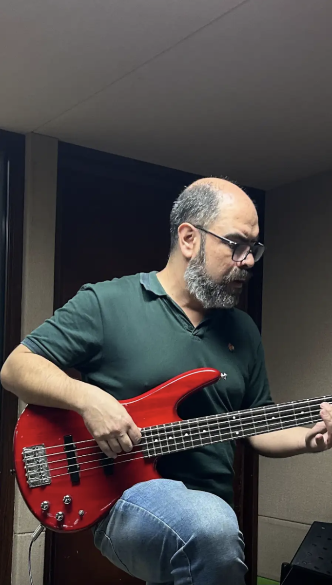 Band teacher Jorge Mario Angel plays bass
